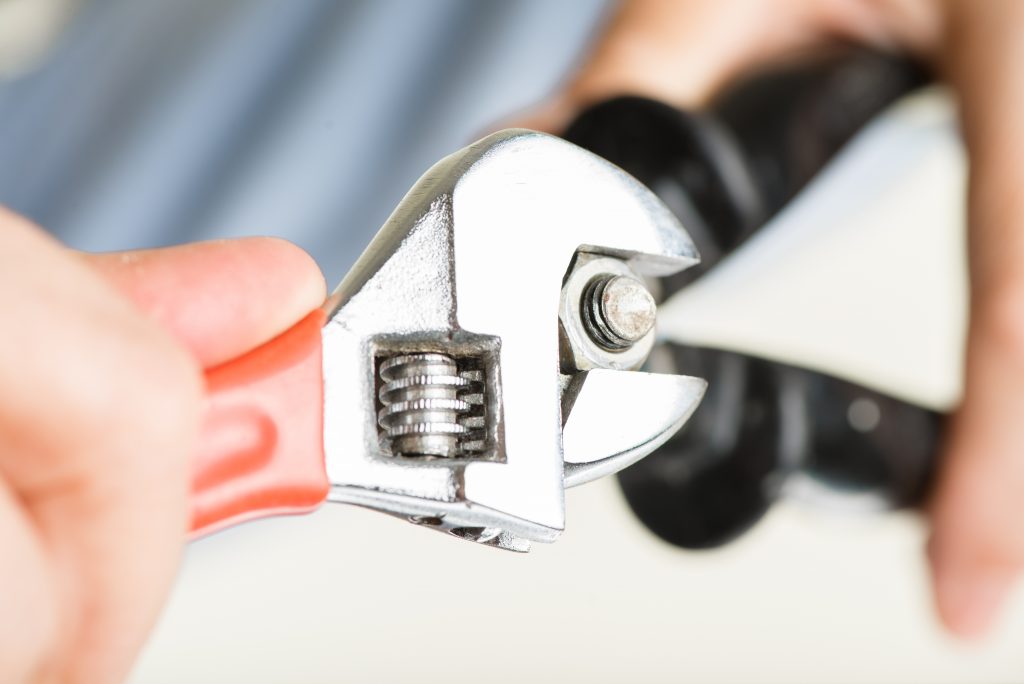 Man repairing an appliance